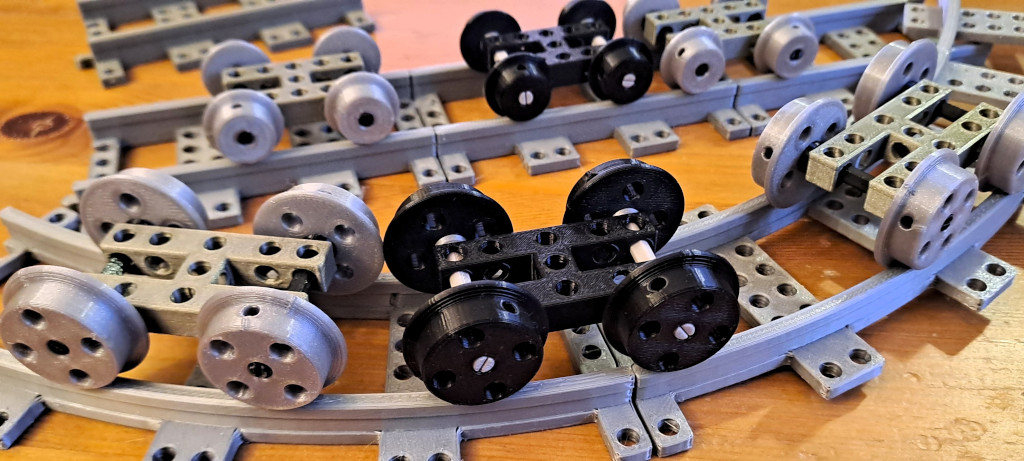 Train tracks and train chassis from the BitBeam construction set.